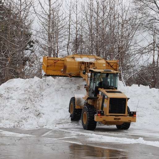 Loader removing snow.